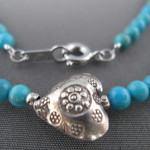 Turquoise Karen silver charm