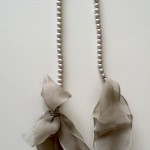 Chiffon bow grey pearl necklace